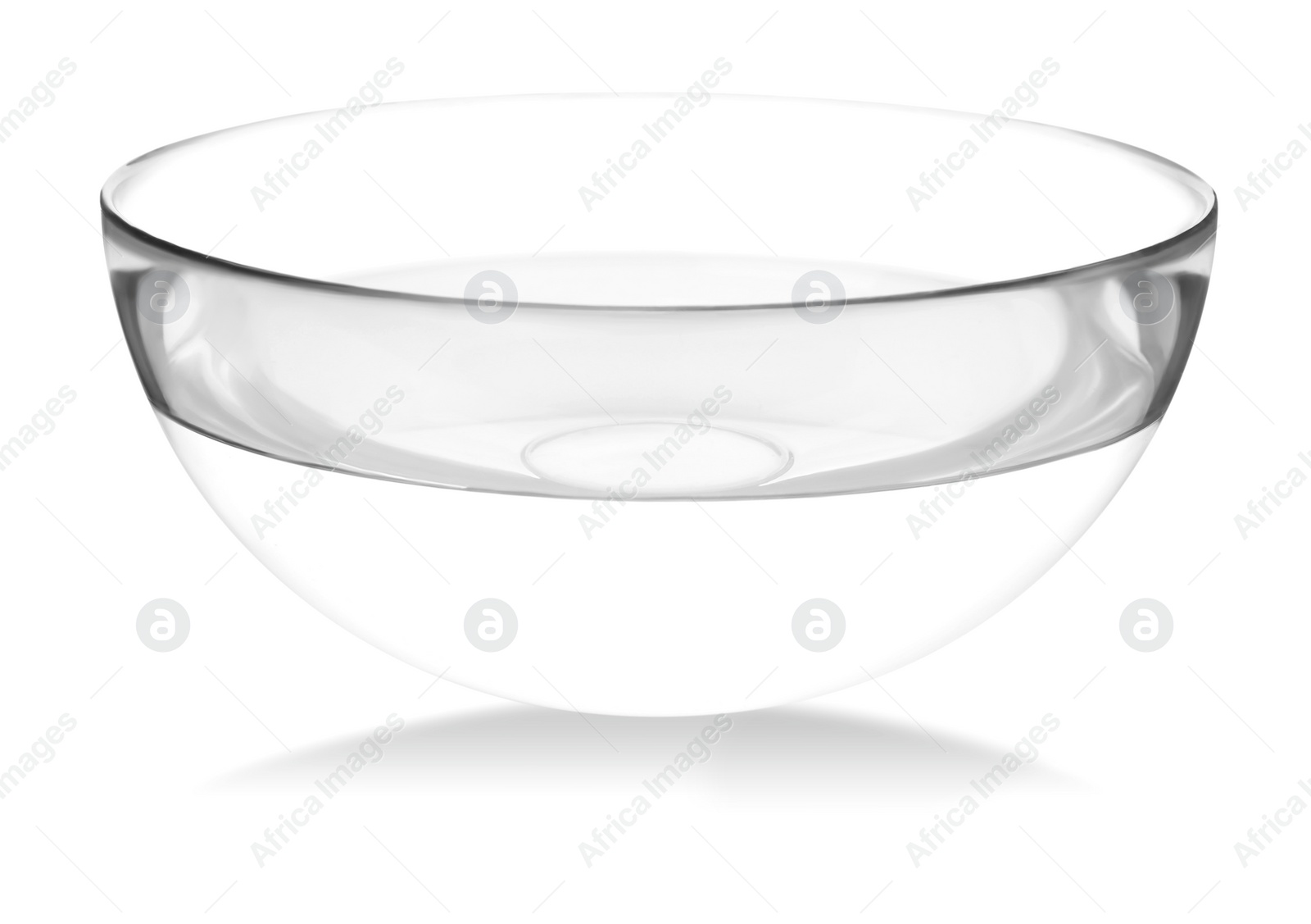 Photo of Glass bowl full of water isolated on white