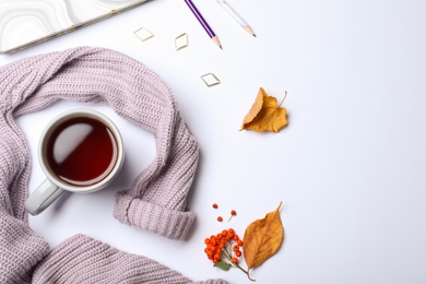 Photo of Composition with cup of hot drink on white background, top view. Cozy autumn atmosphere