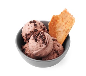 Photo of Tasty ice cream with chocolate chunks and piece of waffle cone in bowl isolated on white