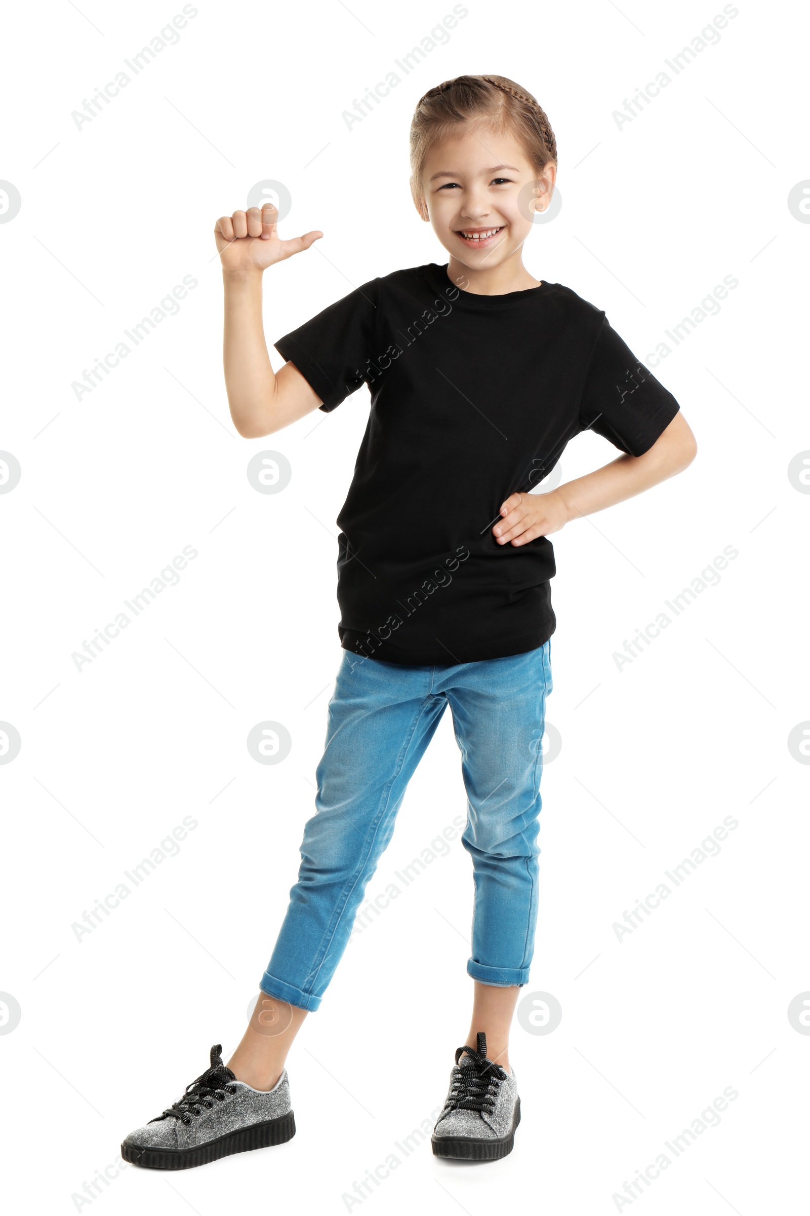 Photo of Little girl in t-shirt on white background. Mockup for design