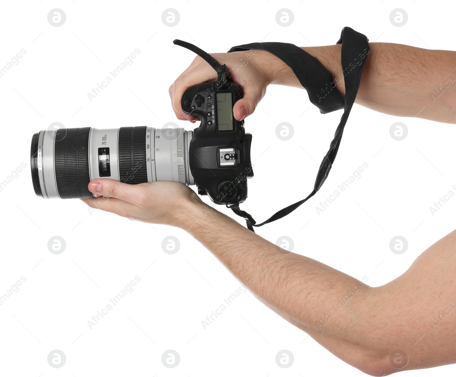 Photo of Photographer holding modern camera on white background, closeup