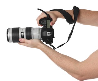 Photo of Photographer holding modern camera on white background, closeup