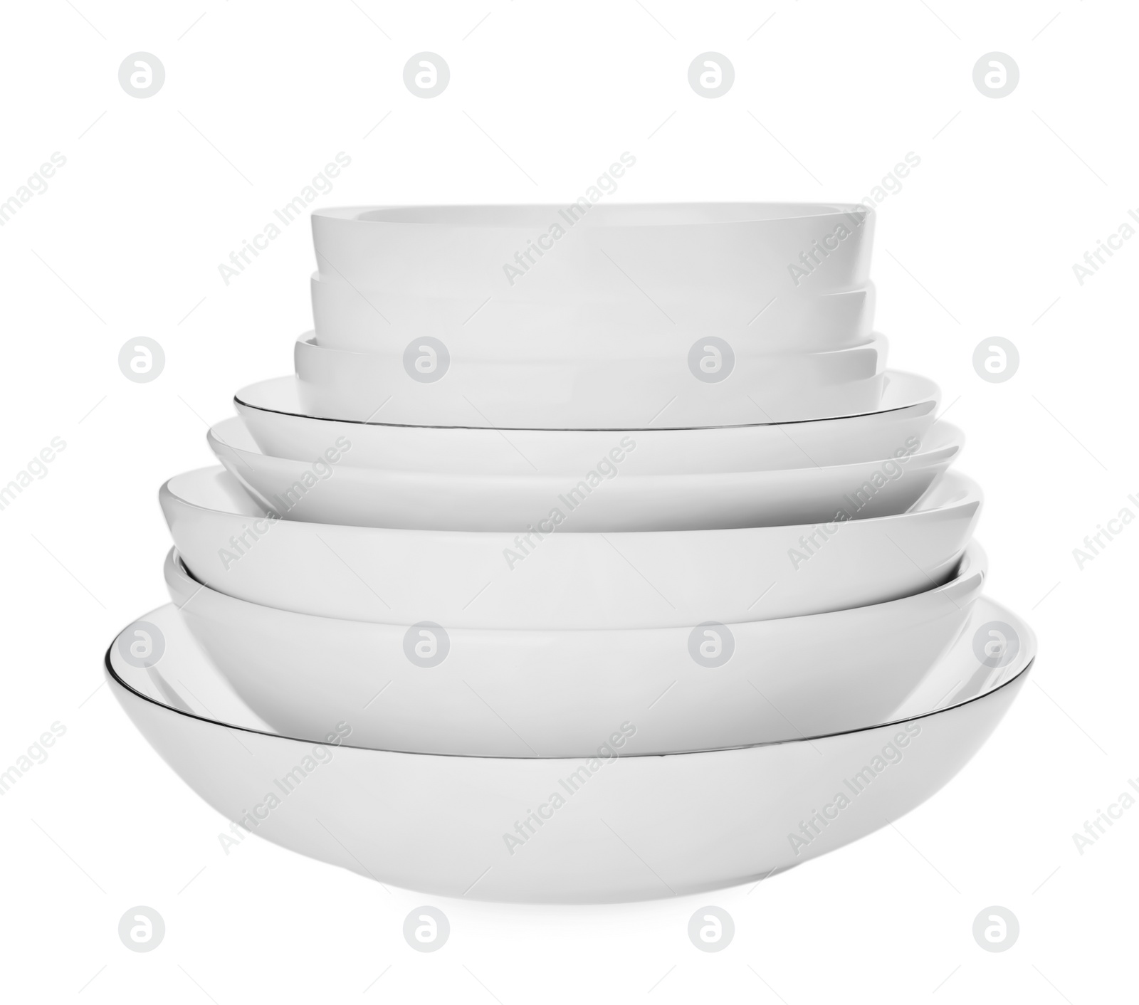 Photo of Set of clean dishes on white background