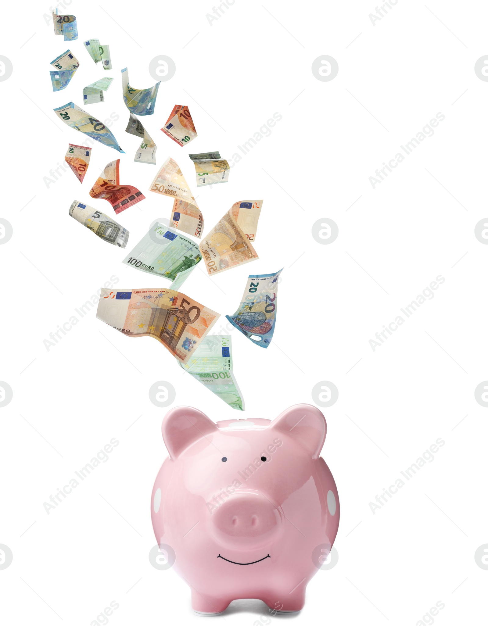 Image of Euro banknotes falling into pink piggy bank on white background