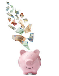 Image of Euro banknotes falling into pink piggy bank on white background