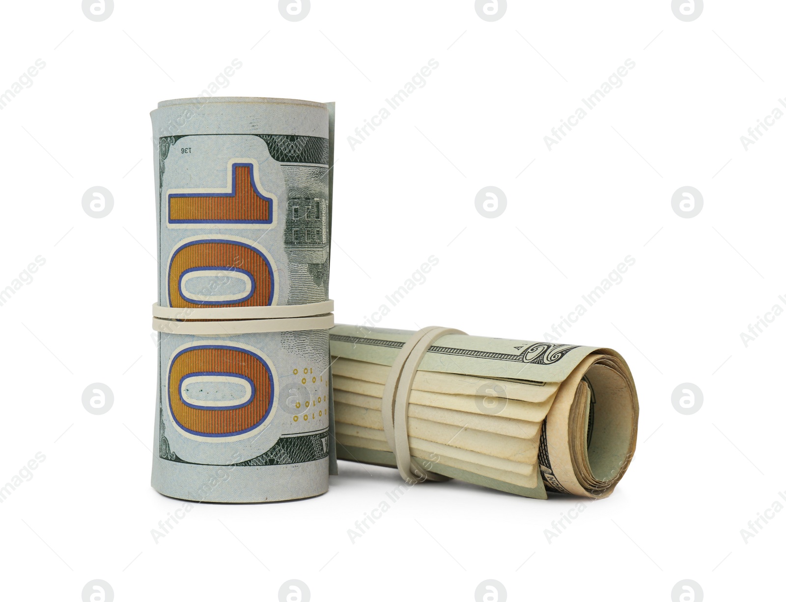 Photo of Rolled dollar banknotes on white background. American national currency