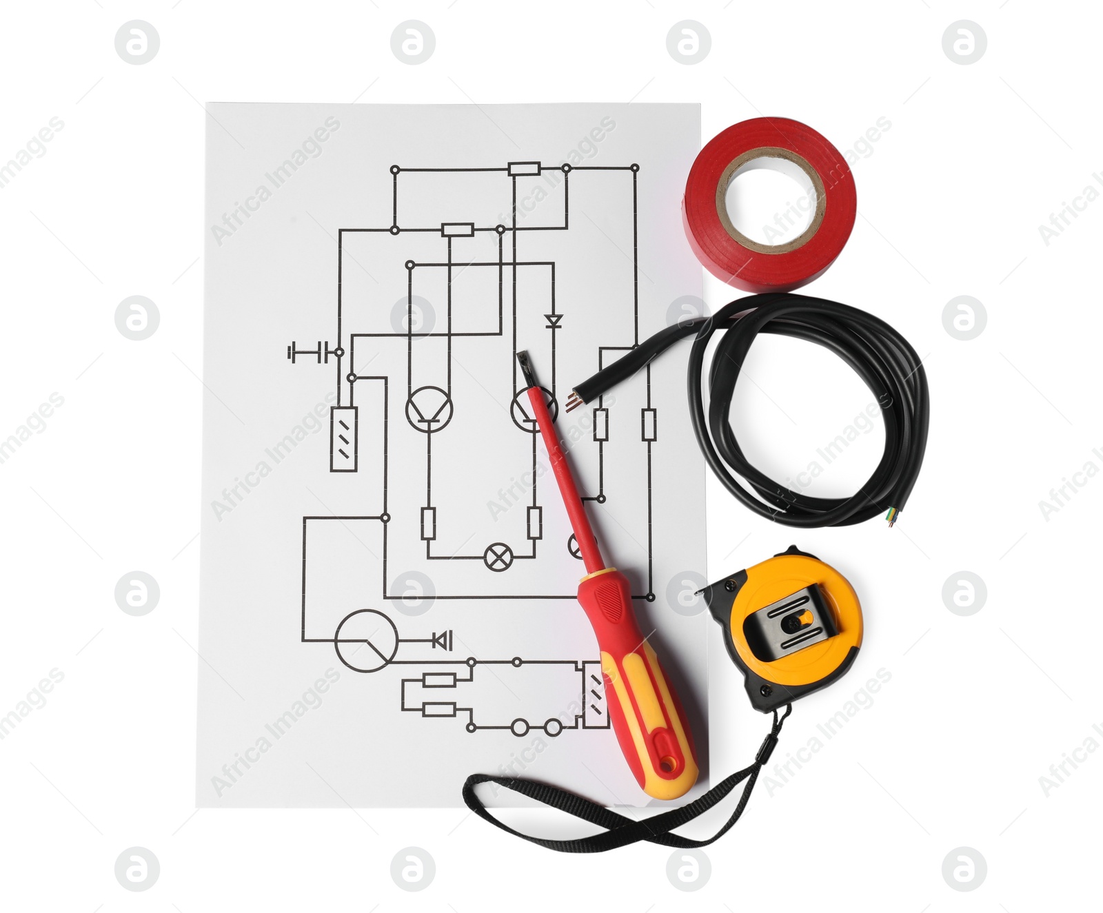 Photo of Wiring diagram, wires, screwdriver and tape measure isolated on white, top view