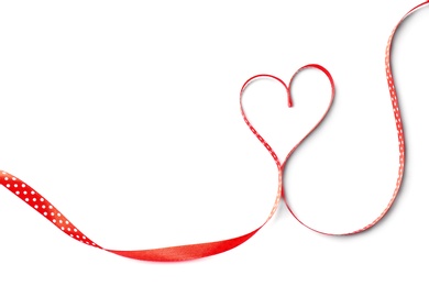 Heart made of satin ribbon on white background, top view