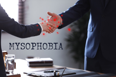 Image of People shaking hands in office, closeup. Mysophobia