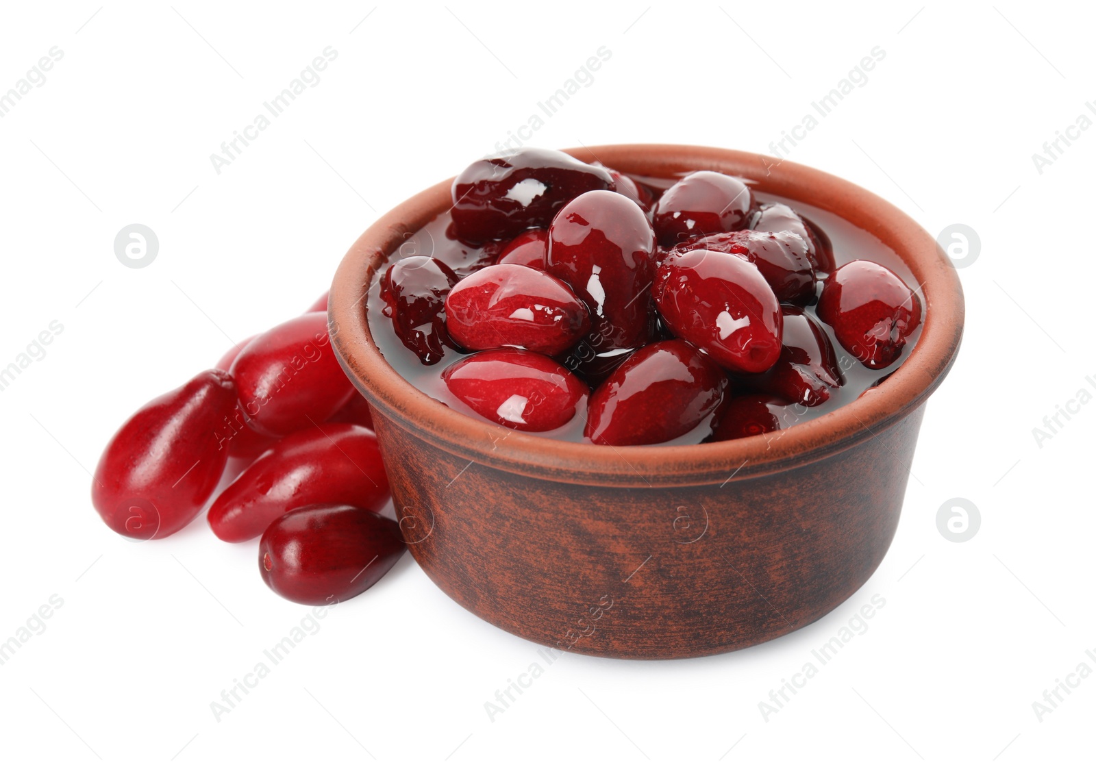 Photo of Delicious dogwood jam with berries and bowl on white background