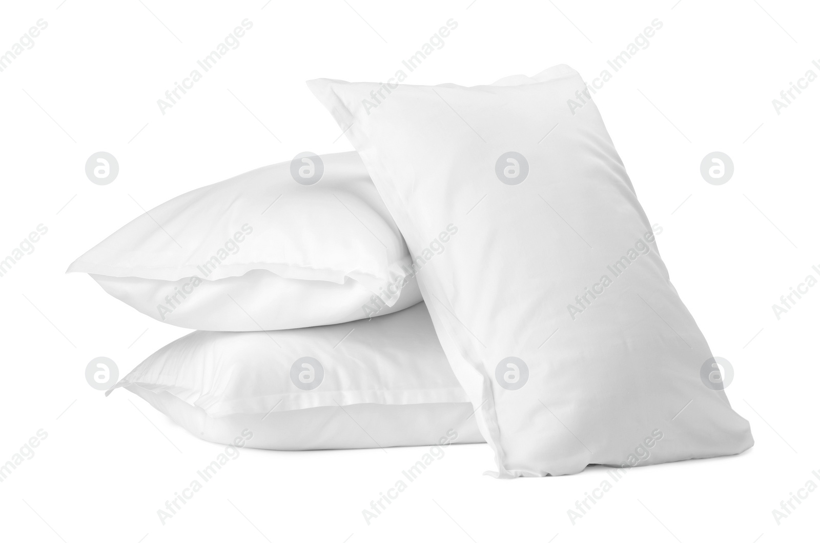 Photo of Many new soft pillows isolated on white