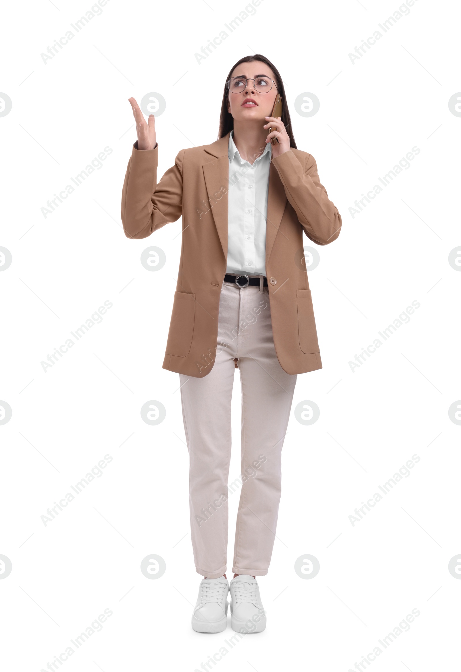 Photo of Beautiful businesswoman talking on smartphone against white background