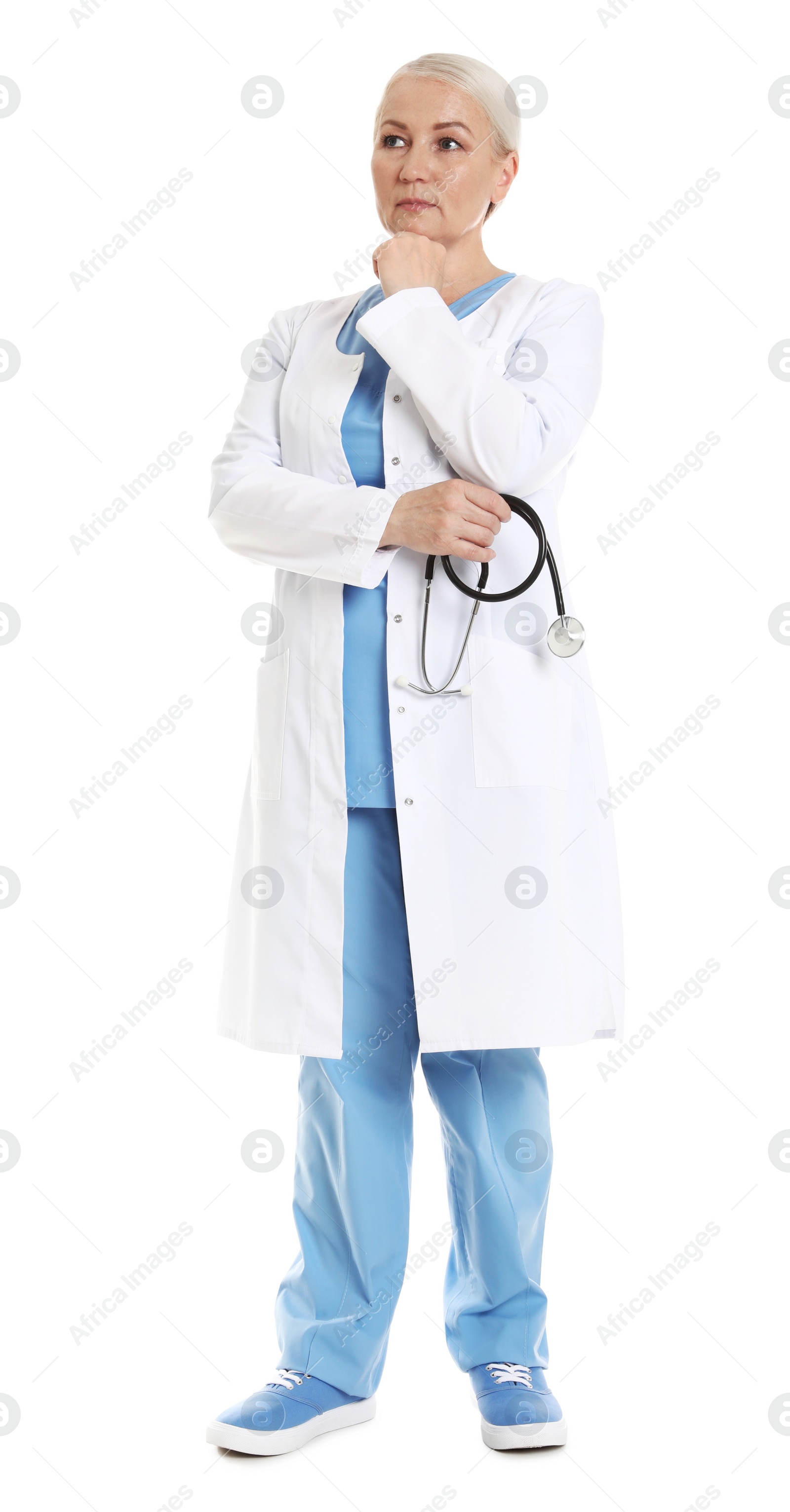 Photo of Full length portrait of pensive female doctor isolated on white. Medical staff