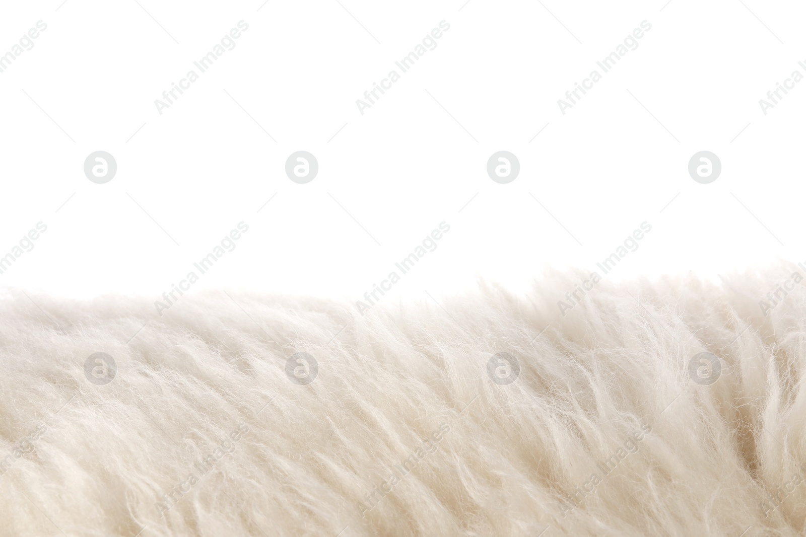 Photo of Soft beige faux fur isolated on white