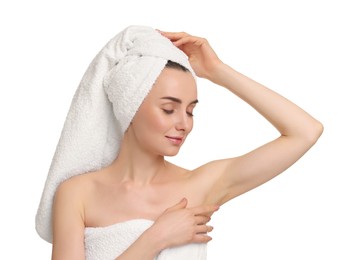 Photo of Beautiful woman showing armpit with smooth clean skin on white background