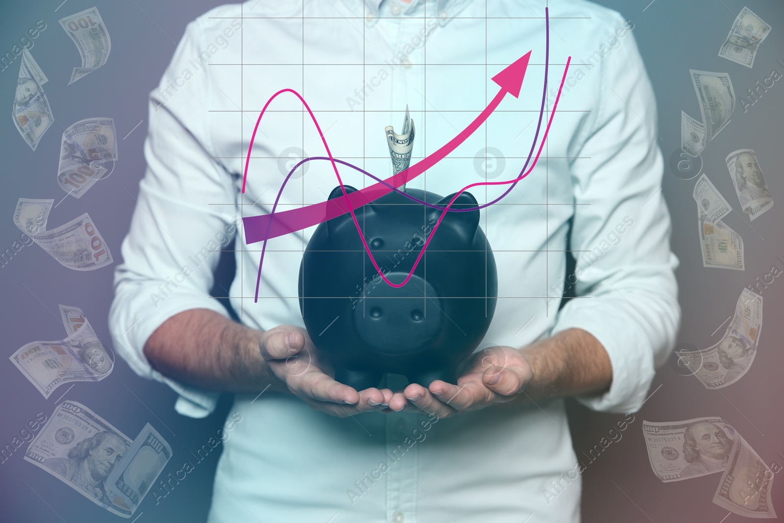 Image of Young man with piggy bank and flying dollar banknotes on grey background, closeup