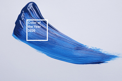 Image of Paint stroke on white background, top view. Color of the year 2020 (Classic blue)