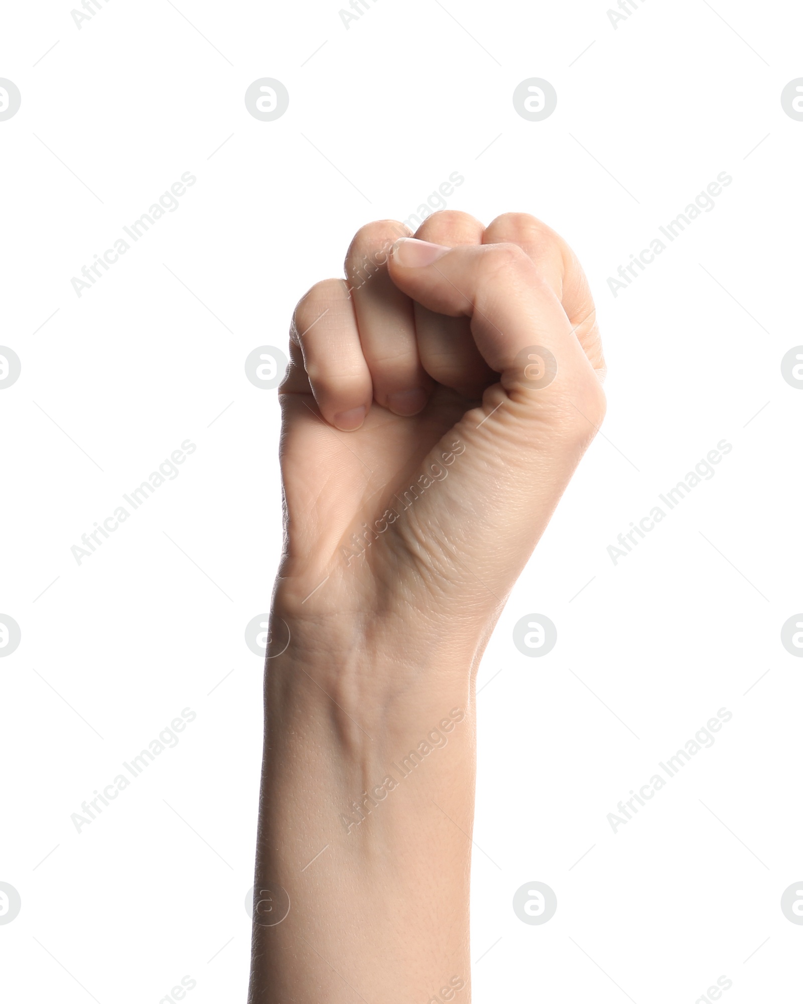 Photo of Young woman showing clenched fist on white background