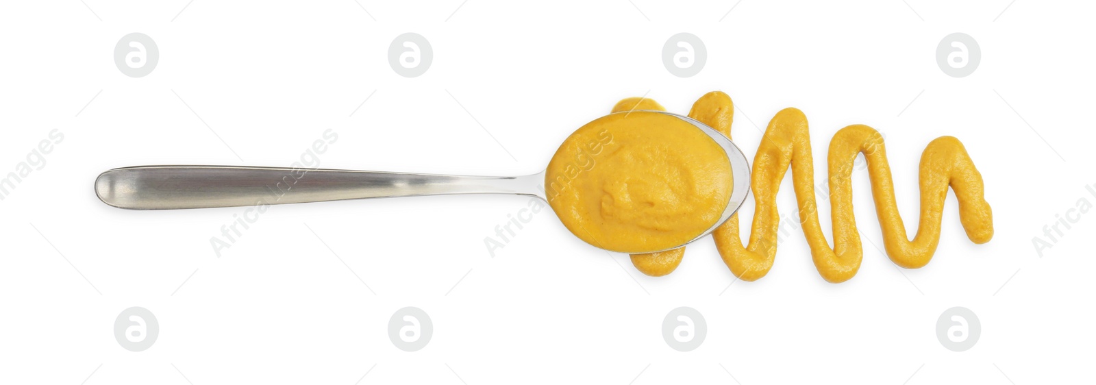 Photo of Tasty mustard sauce and spoon isolated on white, top view