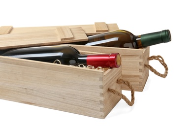 Wooden crates with expensive wine isolated on white