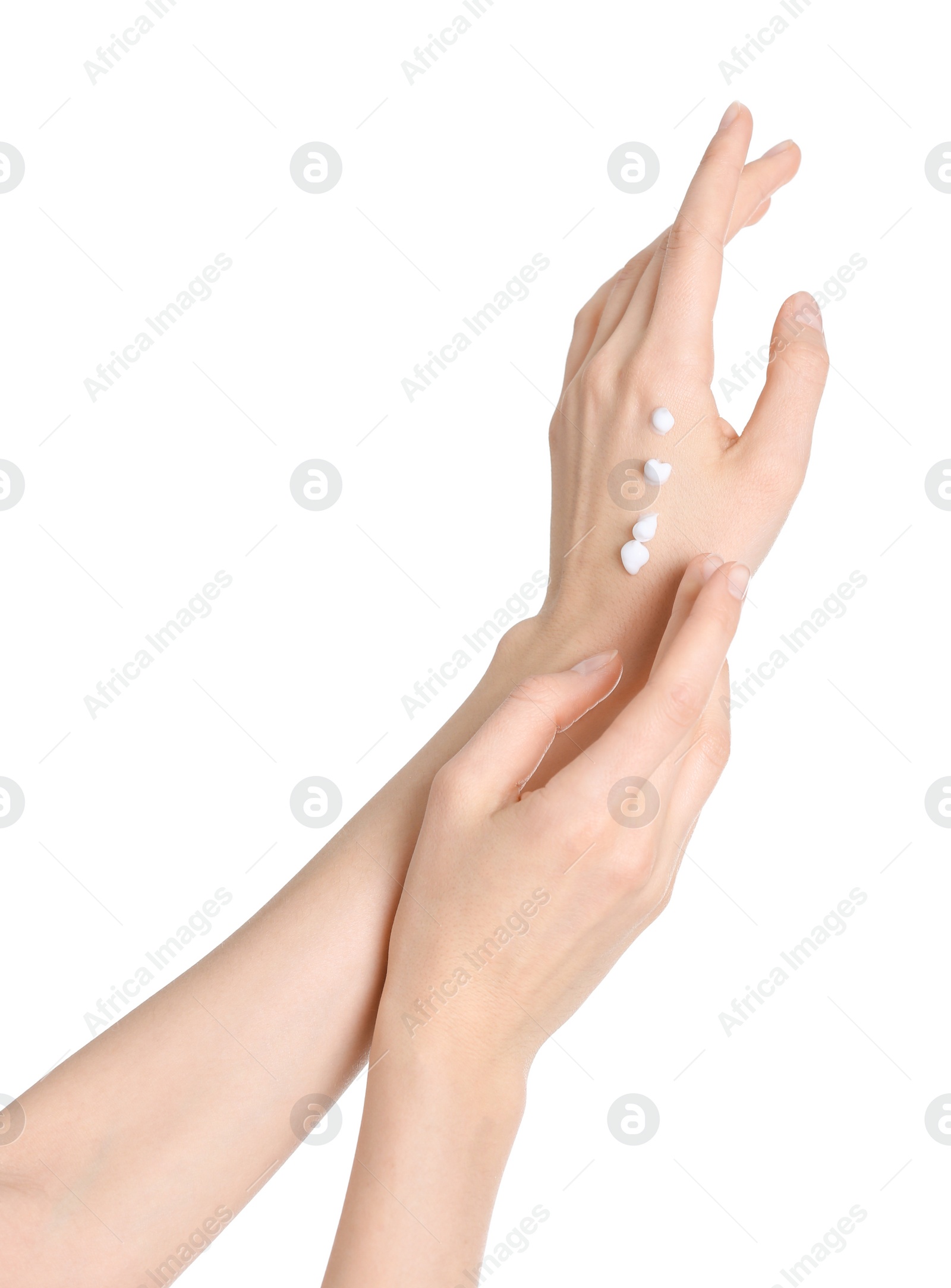 Photo of Young woman applying hand cream on white background