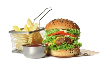 Photo of Burger with delicious patty, french fries and sauce isolated on white