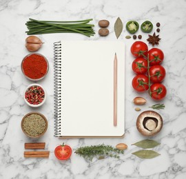 Photo of Open recipe book and different ingredients on white marble table, flat lay. Space for text