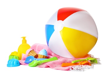 Photo of Beach ball and plastic toys on white background