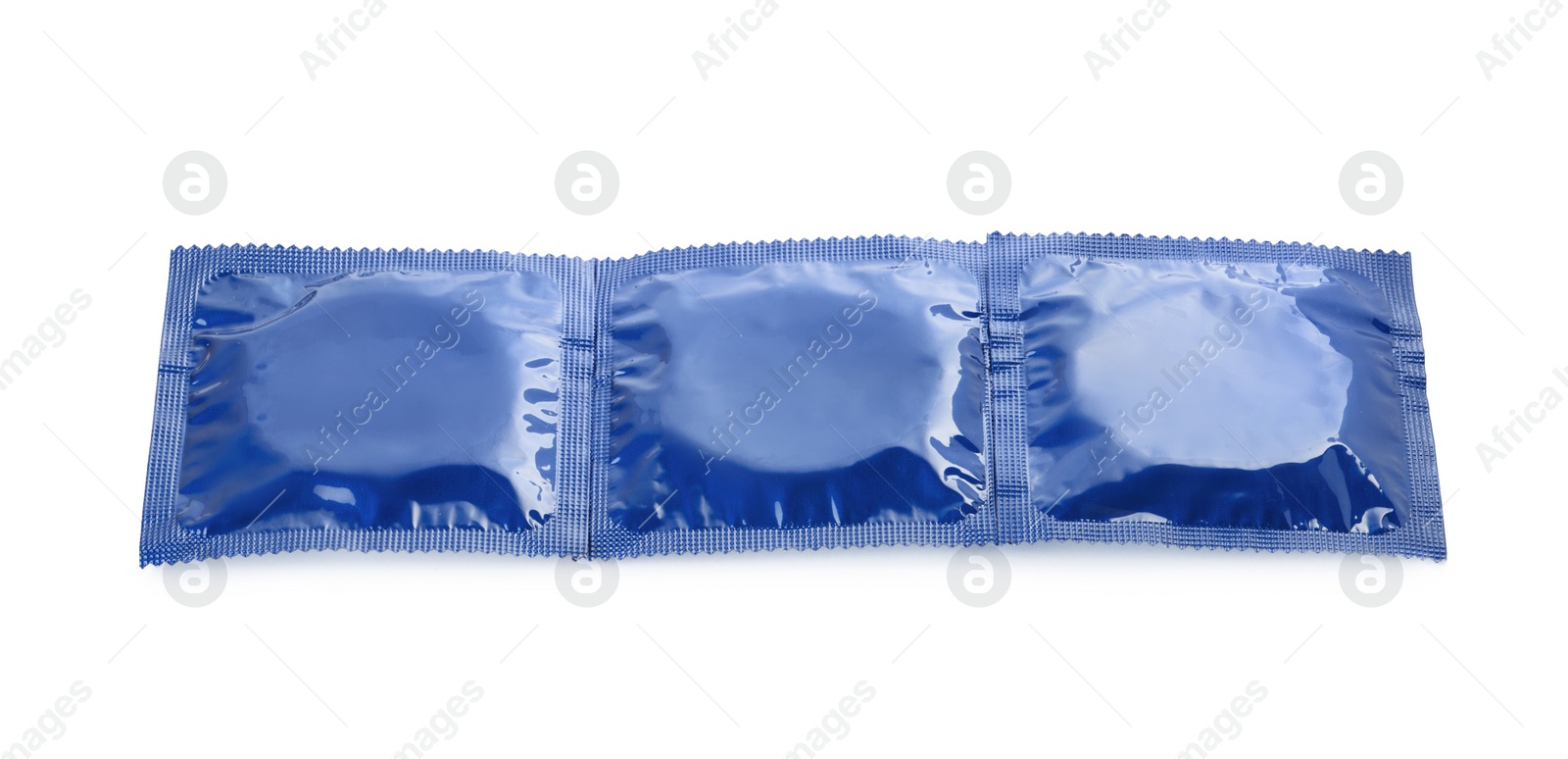 Photo of Packaged condoms on white background. Safe sex