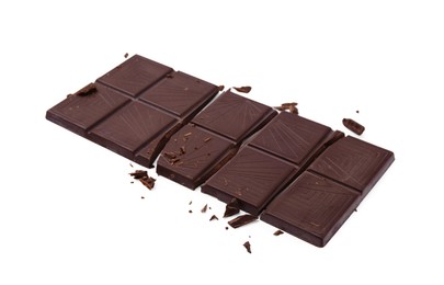 Broken dark chocolate bar on white background