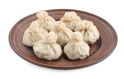 Photo of Plate with tasty fresh khinkali (dumplings) and spices isolated on white. Georgian cuisine