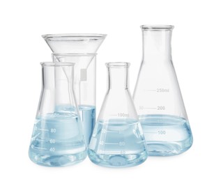 Photo of Different laboratory glassware with water isolated on white
