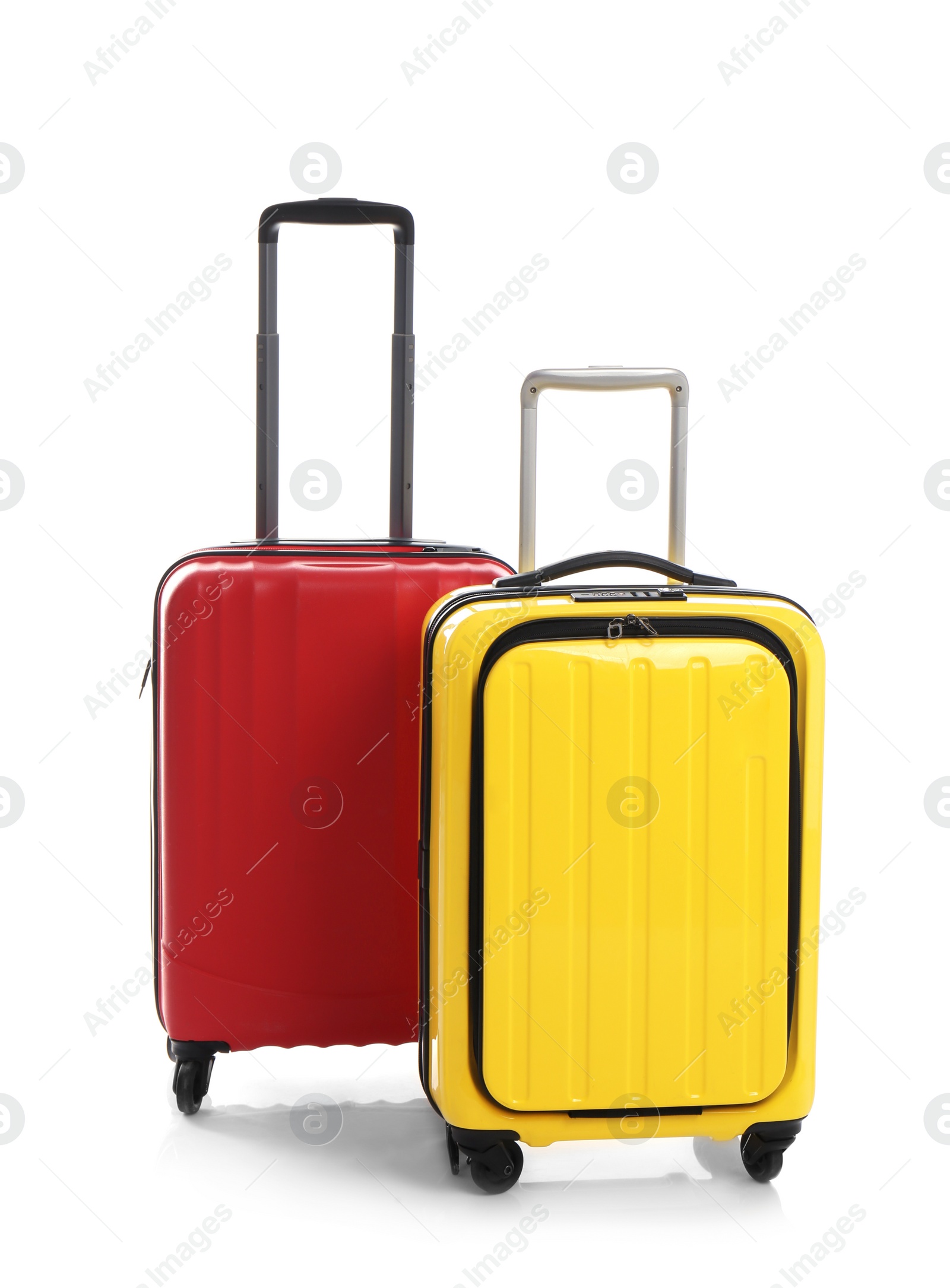 Photo of Modern suitcases for travelling on white background