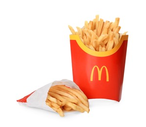 Photo of MYKOLAIV, UKRAINE - AUGUST 11, 2021: Big and small portions of McDonald's French fries on white background