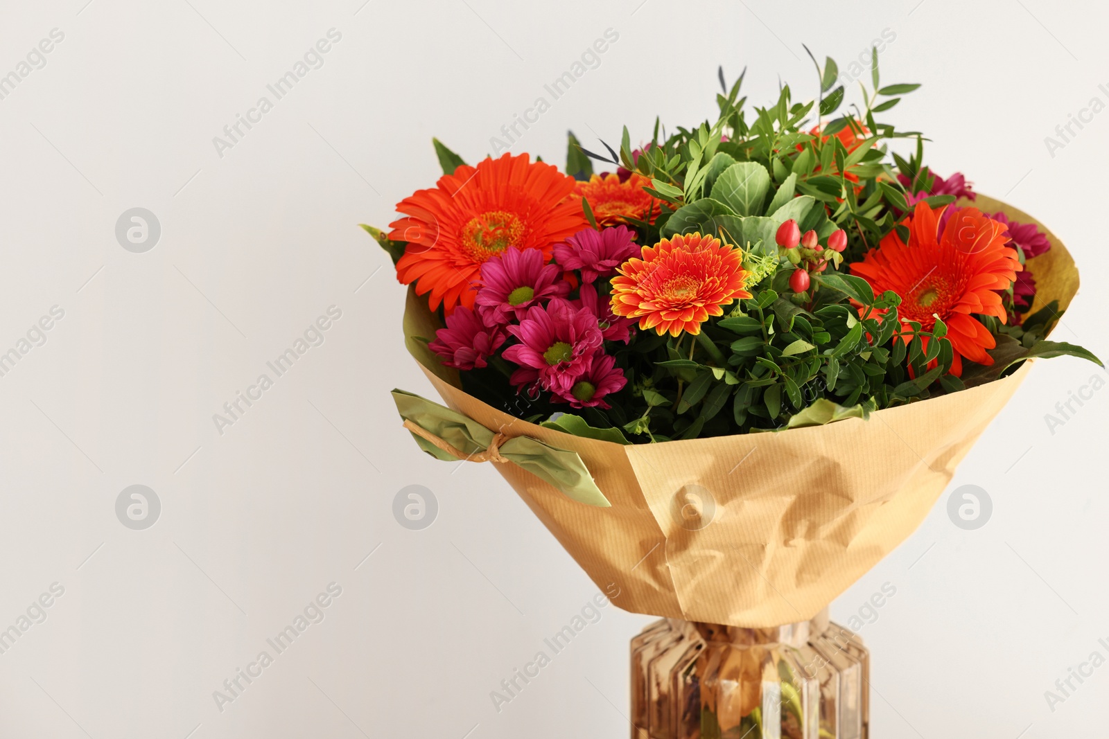 Photo of Bouquet of beautiful flowers on white background, closeup. Space for text