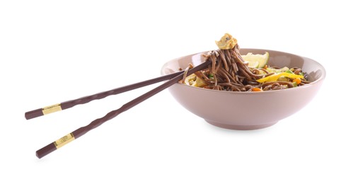 Photo of Stir-fry. Delicious cooked noodles with chicken in bowl and chopsticks isolated on white