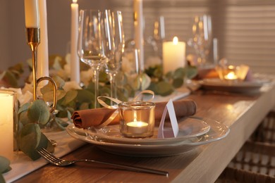 Festive table setting with beautiful tableware and decor indoors