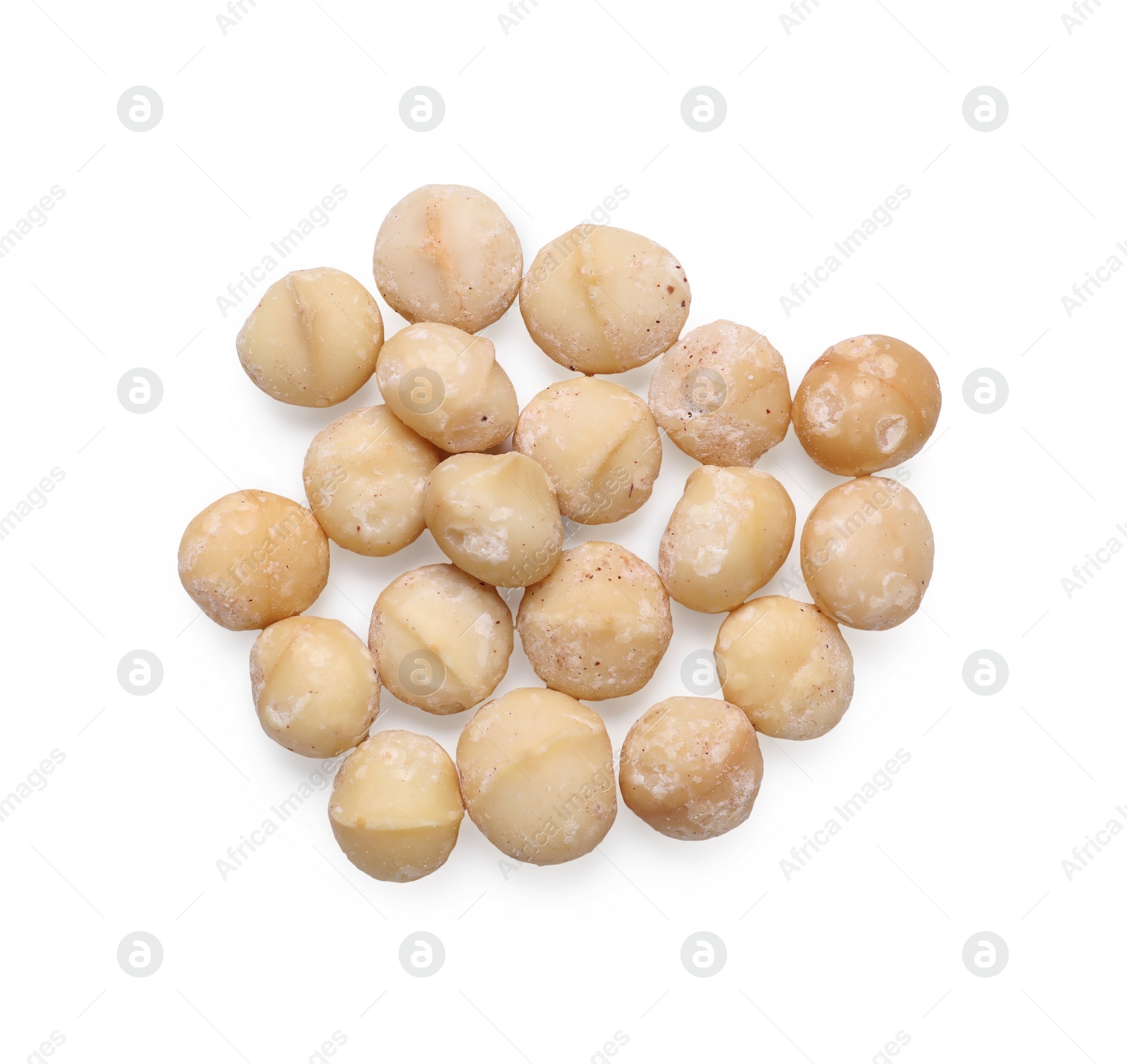 Photo of Delicious shelled Macadamia nuts isolated on white, top view