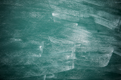 Dirty green chalkboard as background. Space for text