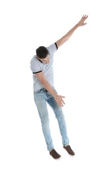 Photo of Man in casual clothes posing on white background