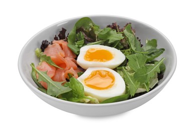 Delicious salad with boiled egg, salmon and arugula in bowl isolated on white