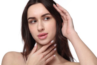 Portrait of beautiful young woman on white background