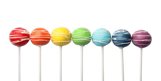 Photo of Delicious colorful cake pops on white background, top view