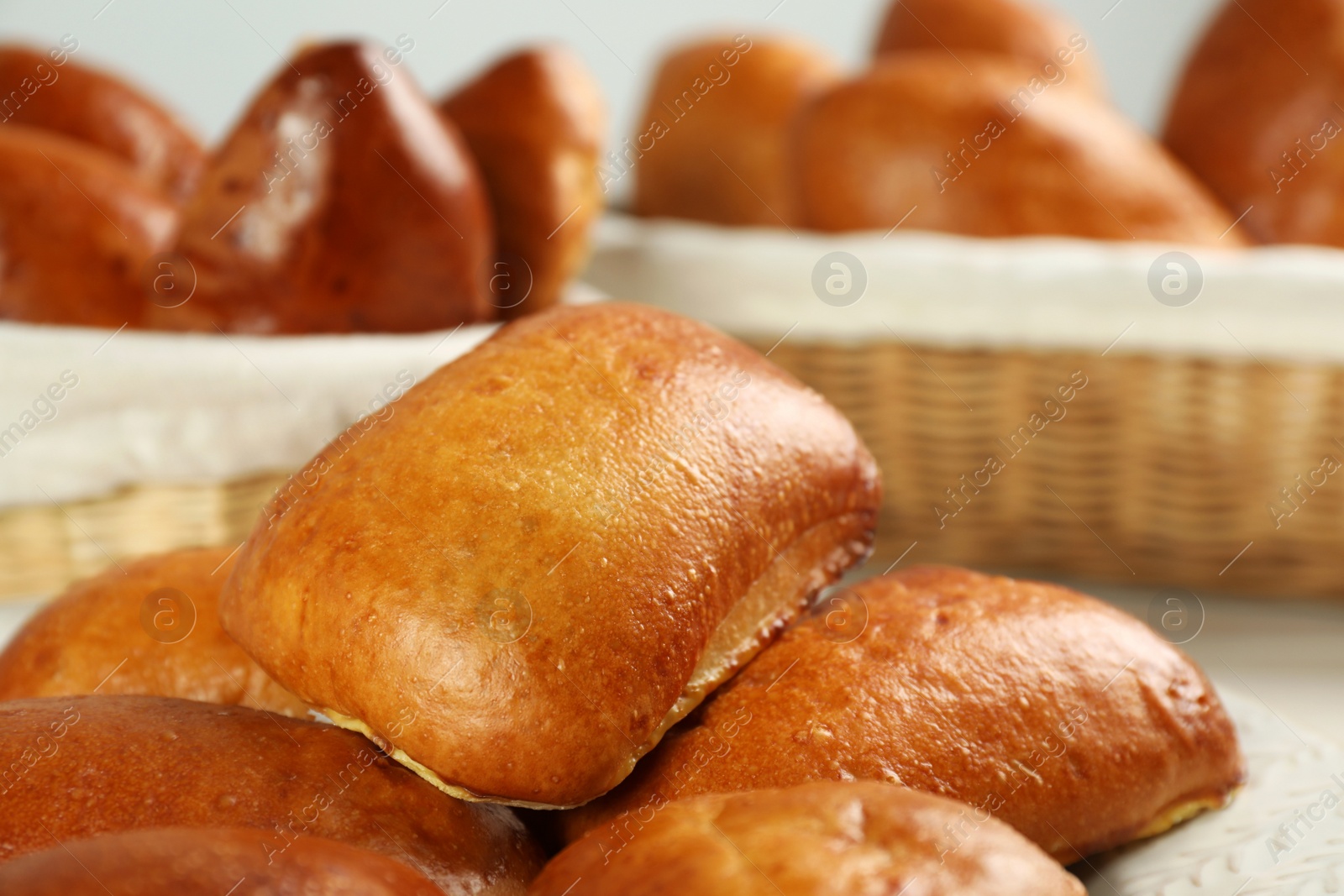 Photo of Delicious baked patties on table, closeup view