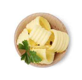 Photo of Tasty butter curls and fresh parsley in bowl isolated on white, top view