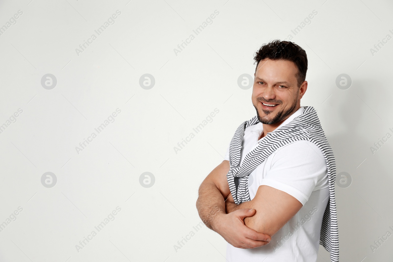 Photo of Portrait of handsome man on white background