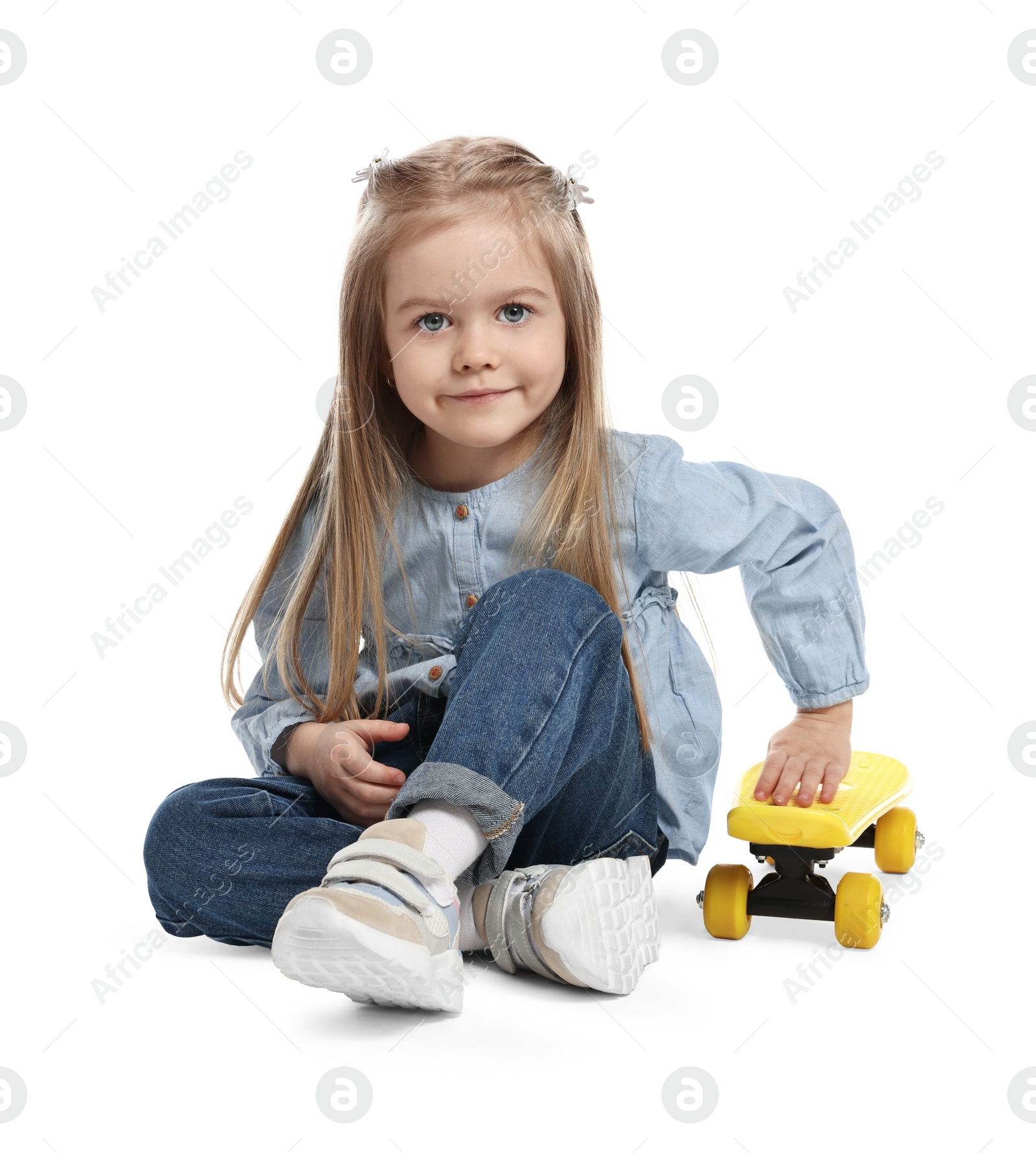 Photo of Fashion concept. Stylish girl with skateboard on white background