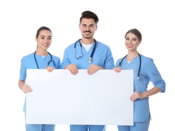 Photo of Medical students with blank poster on white background