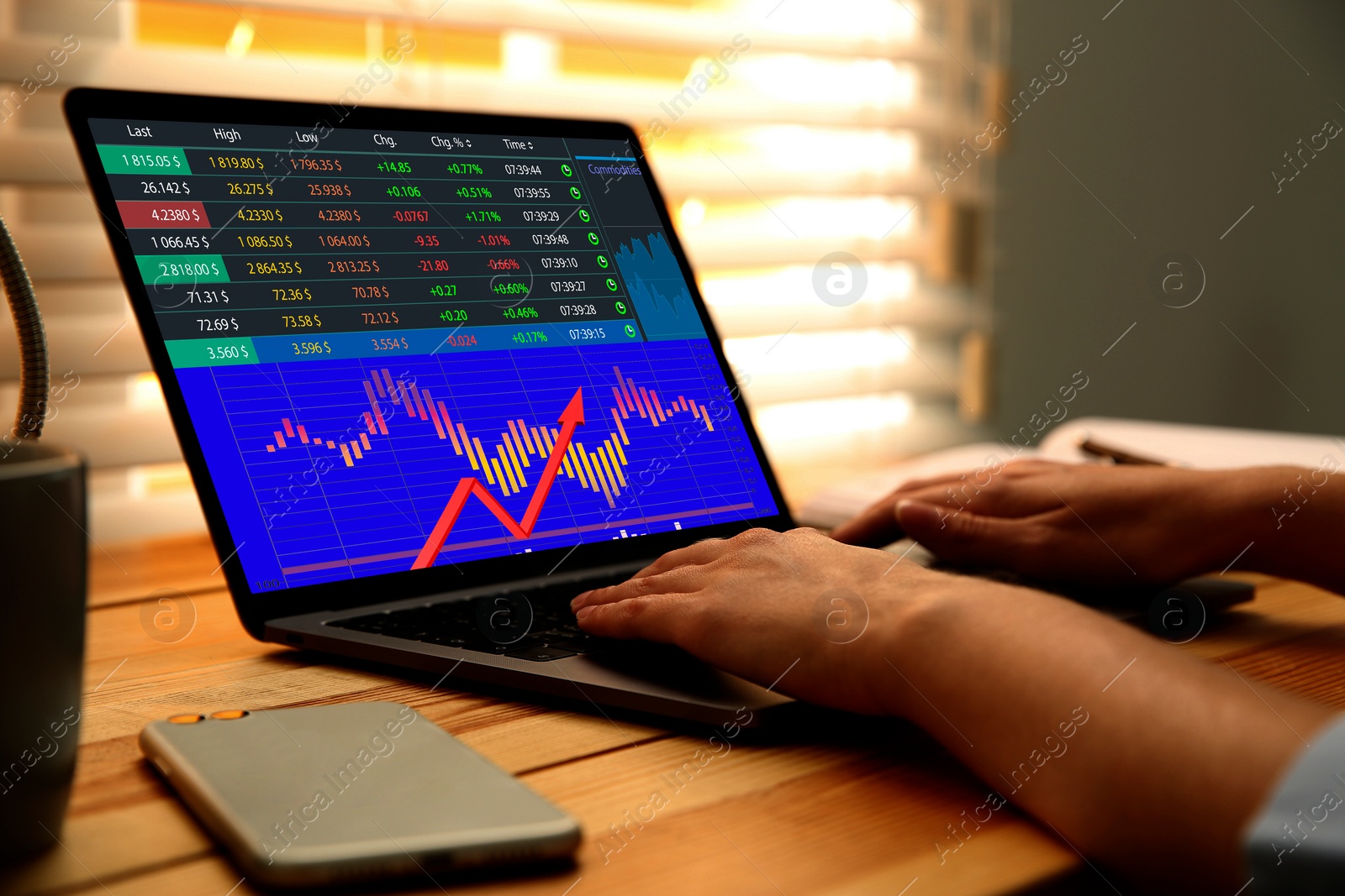 Image of Woman analyzing situation on stock exchange market via laptop, closeup. Data and graph on screen