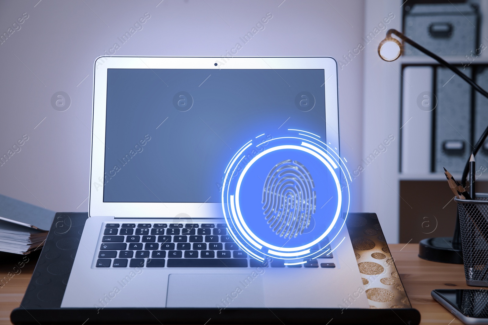 Image of Fingerprint identification. Modern laptop on table indoors